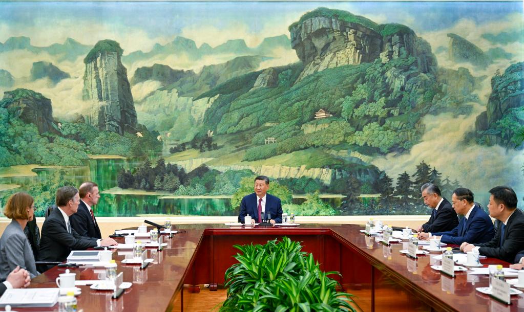 Xi meets U.S. national security advisor 